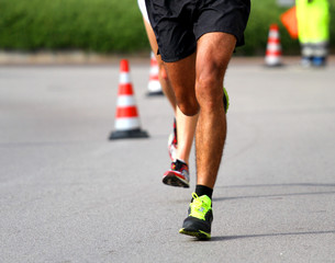Marathoner runs fast for the paved road
