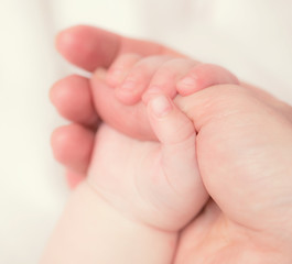 Fototapeta na wymiar Baby's hand