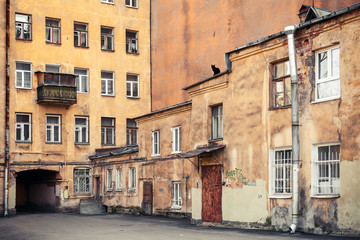 Fototapeta na wymiar Street fragment with yellow houses. Saint-Petersburg, Russia