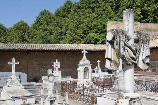old cemetery with granite sculptures