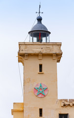 Yellow lighthouse tower in Cap Malabata, Tangier, Morocco