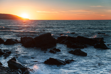 Sunset on the Atlantic ocean coast in Morocco, Tangier