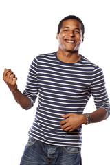 Fototapeta premium dancing happy dark-skinned young man on white background