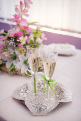 two wedding glass on table