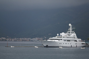 Fototapeta na wymiar Golden Odyssey yacht in the port of Tivat on JUNE