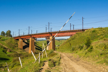 Summer Carpathians landscape with a gate on a foreground and old