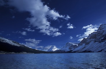 Snow-Covered Mountains Across Lake