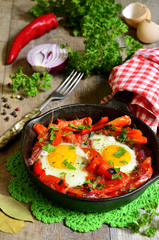 Fried eggs with vegetables.