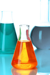 Test tubes with colorful liquids close up