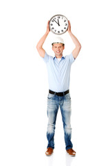 Businessman wearing helmet with clock
