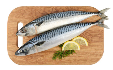 mackerel fish on wooden plate isolated