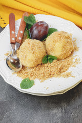 Plum dumplings on plate