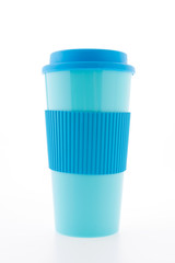 Blue plastic coffee mug isolated on white background