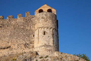 Fototapeta na wymiar Medieval stone castle on the rock in ancient Calafell, Spain