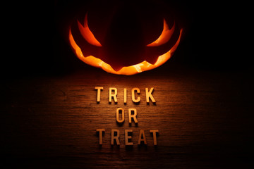 Spooky Halloween background with jack o lantern - Trick or Treat