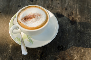 Coffee cup on wooden table
