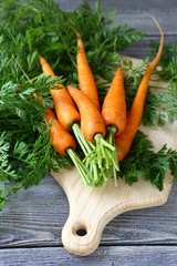 juicy carrot on a chopping board