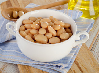 White beans on a  wooden   background