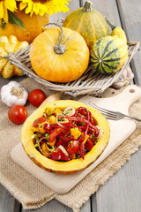 Vegetable salad served in pumpkin