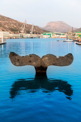 Fototapeta premium Whale tail sculpture in Cartagena port at Murcia