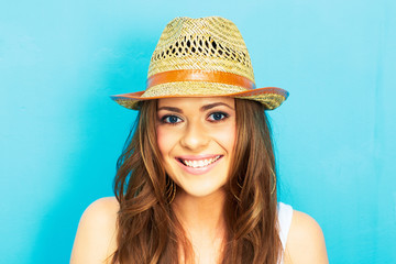 beautifull woman with straw hat smiling and happy