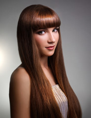 Beautiful girl with long straight hair