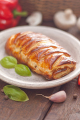 chicken breast in a French pastry.