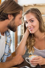 Happy couple enjoying a coffee