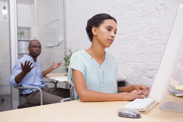 Upset businessman annoyed with colleague