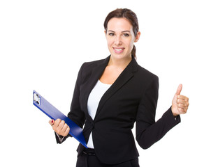 Business woman with clipboard and thumb up