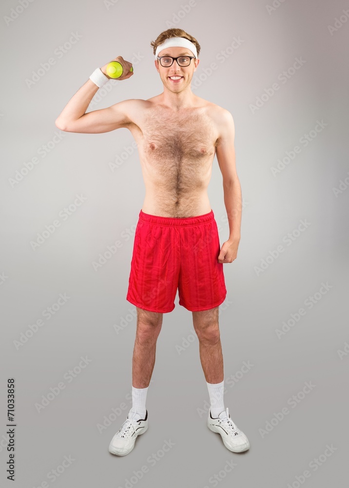 Poster geeky shirtless hipster posing with dumbbell