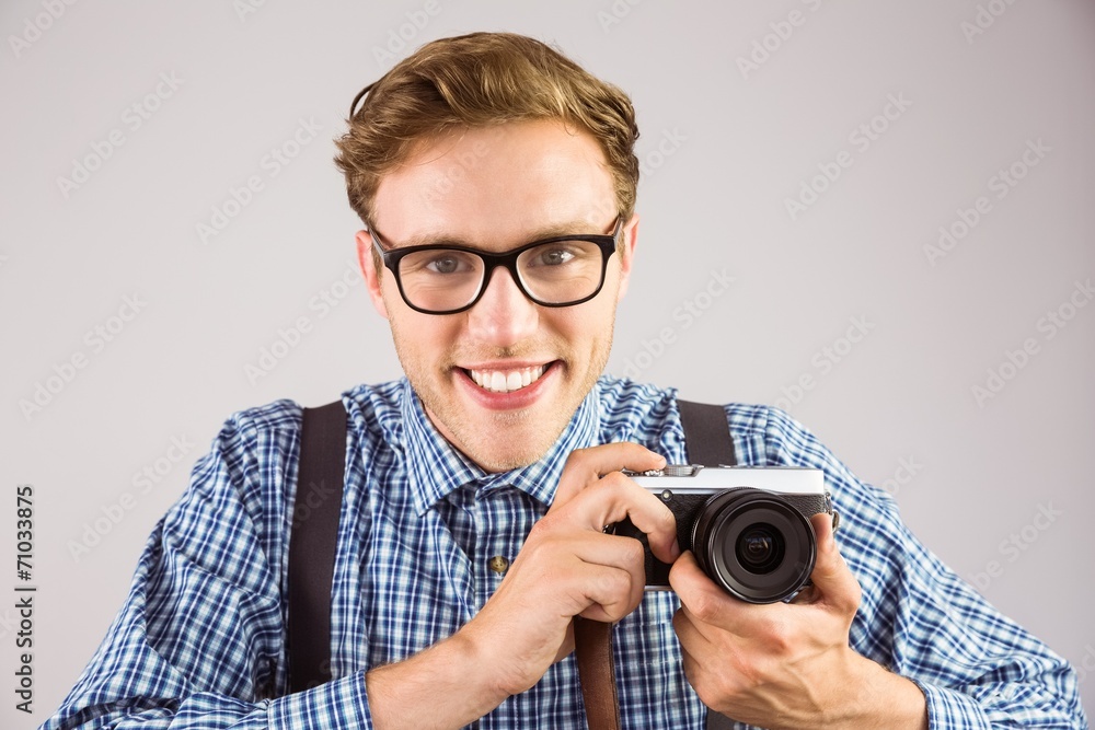 Aufkleber geeky hipster holding a retro camera