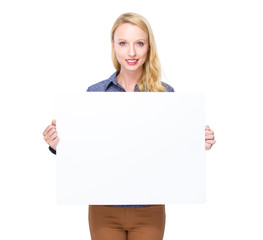 Fototapeta premium Caucasian woman hold blank board