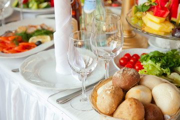 place setting at laid restaurant banquet table 