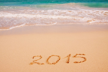2015 written on sandy beach,silvester. 
