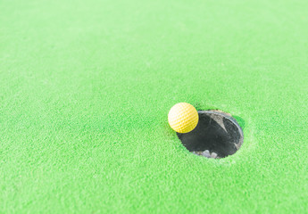 golf ball in the hole