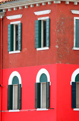 red house on the island of BURANO near Venice