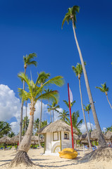 Exotic beach with hut and canoe on one of the Caribbean Islands - 71042269