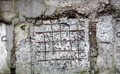 Concrete surface with visible joints and reinforcement bars