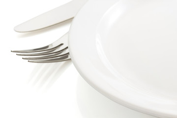 knife and fork on white