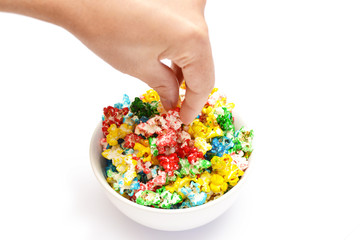 Person picking colors popcorn bowl