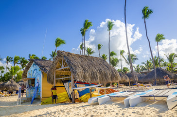 Kayaks, sailboats and catamarans for rent on Caribbean beach - obrazy, fototapety, plakaty