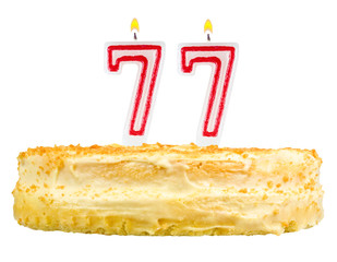 birthday cake with candles number seventy seven isolated