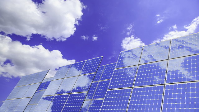 photovoltaic solar panels with blue panoramic sky; time lapse
