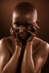 Fototapeta na wymiar beautiful woman with a bronze bodypainting