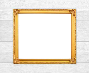 blank golden frame on wood wall