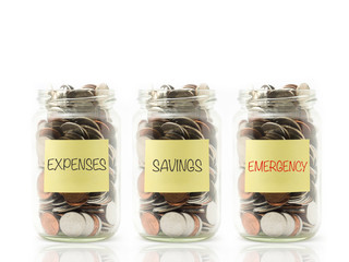 Jar with expenses, savings and emergency label.