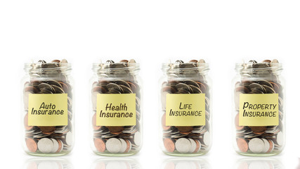 Isolated coins in jar with insurance concept