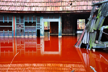 A house flooded by industrial mining water