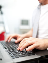 Man working on the laptop at home